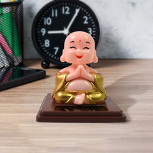 Solar-Powered Moving Head Buddha Statue – Automatic Wobble Car Ornament & Home Décor