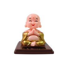 Solar-Powered Moving Head Buddha Statue – Automatic Wobble Car Ornament & Home Décor